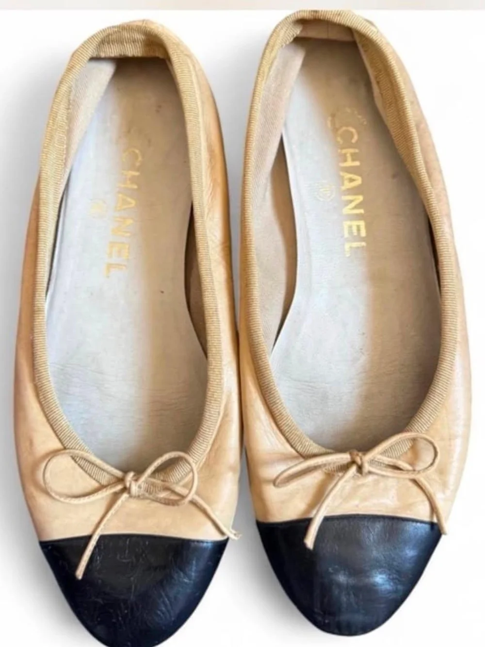 CHANEL Beige and Black Two-Tone Leather Ballet Flats